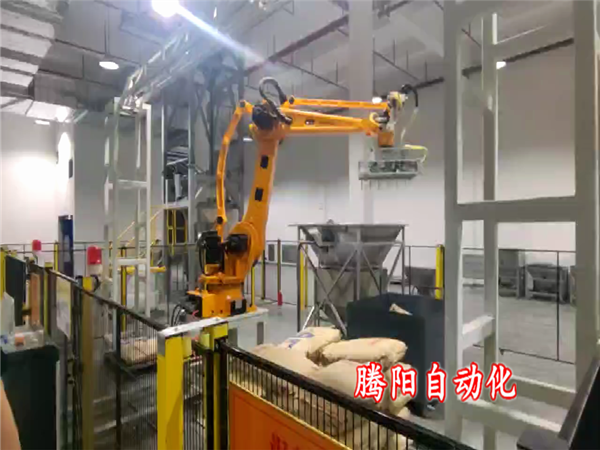 塑料顆粒拆包投料機器人自動完成拆包投料